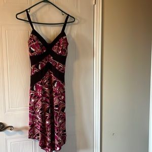 Bright summer dress. White, pink and brown with uneven length. Adjustable straps